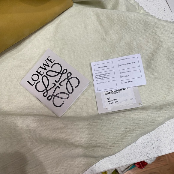 LOEWE
Flamenco leather-trimmed nubuck clutch - Picture 14 of 16